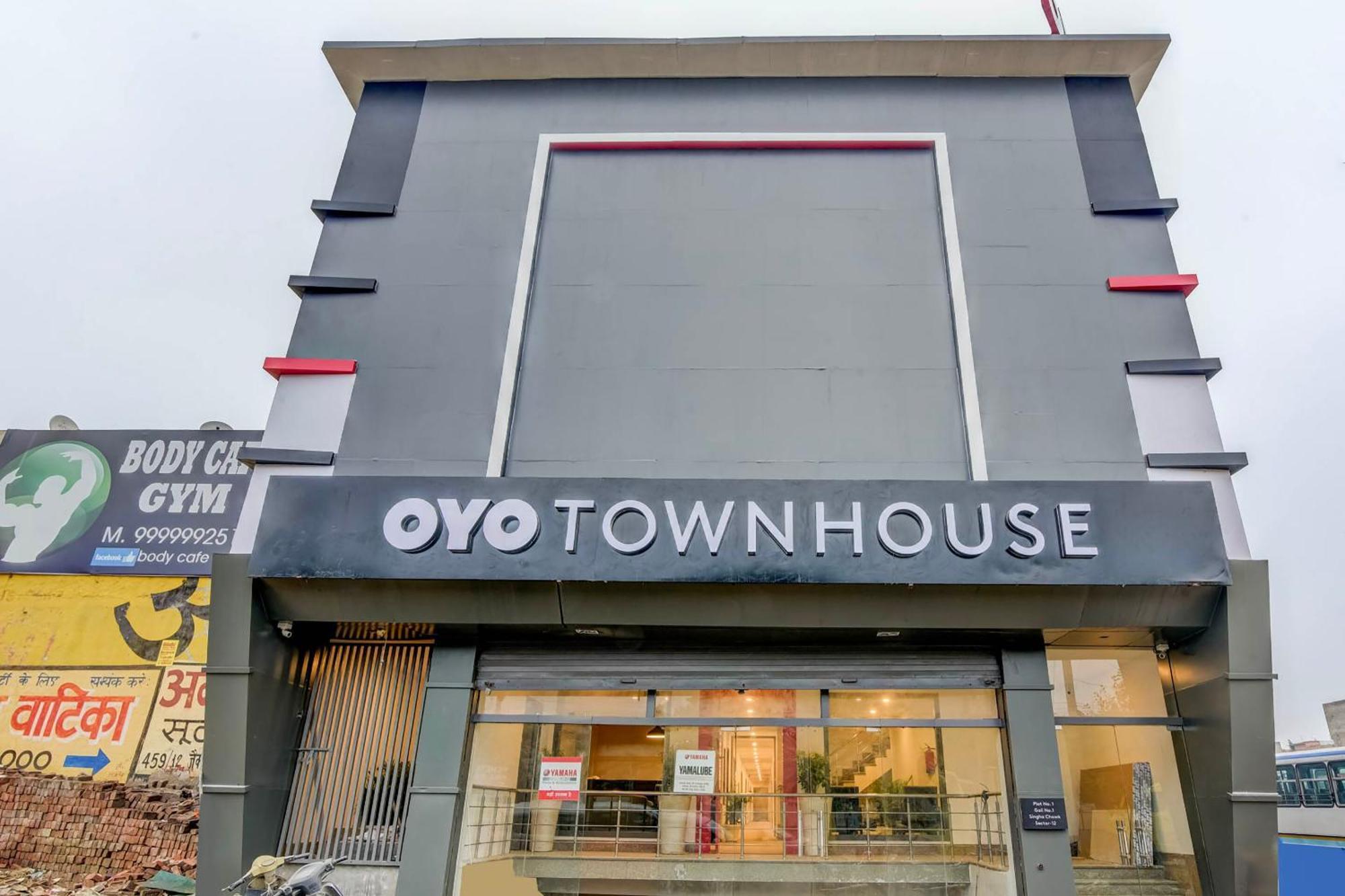 ホテル Oyo タウンハウス 347 ニア バス スタンド グルガウン エクステリア 写真