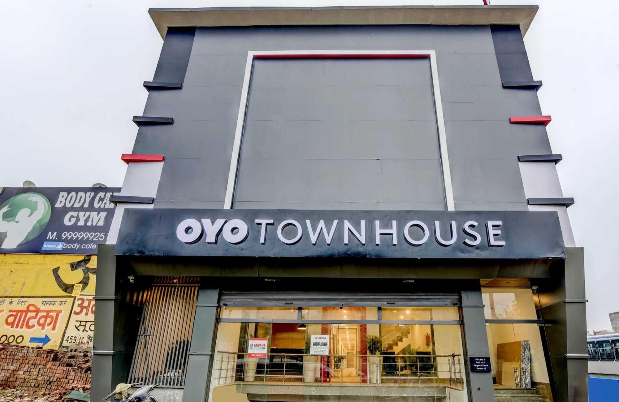ホテル Oyo タウンハウス 347 ニア バス スタンド グルガウン エクステリア 写真